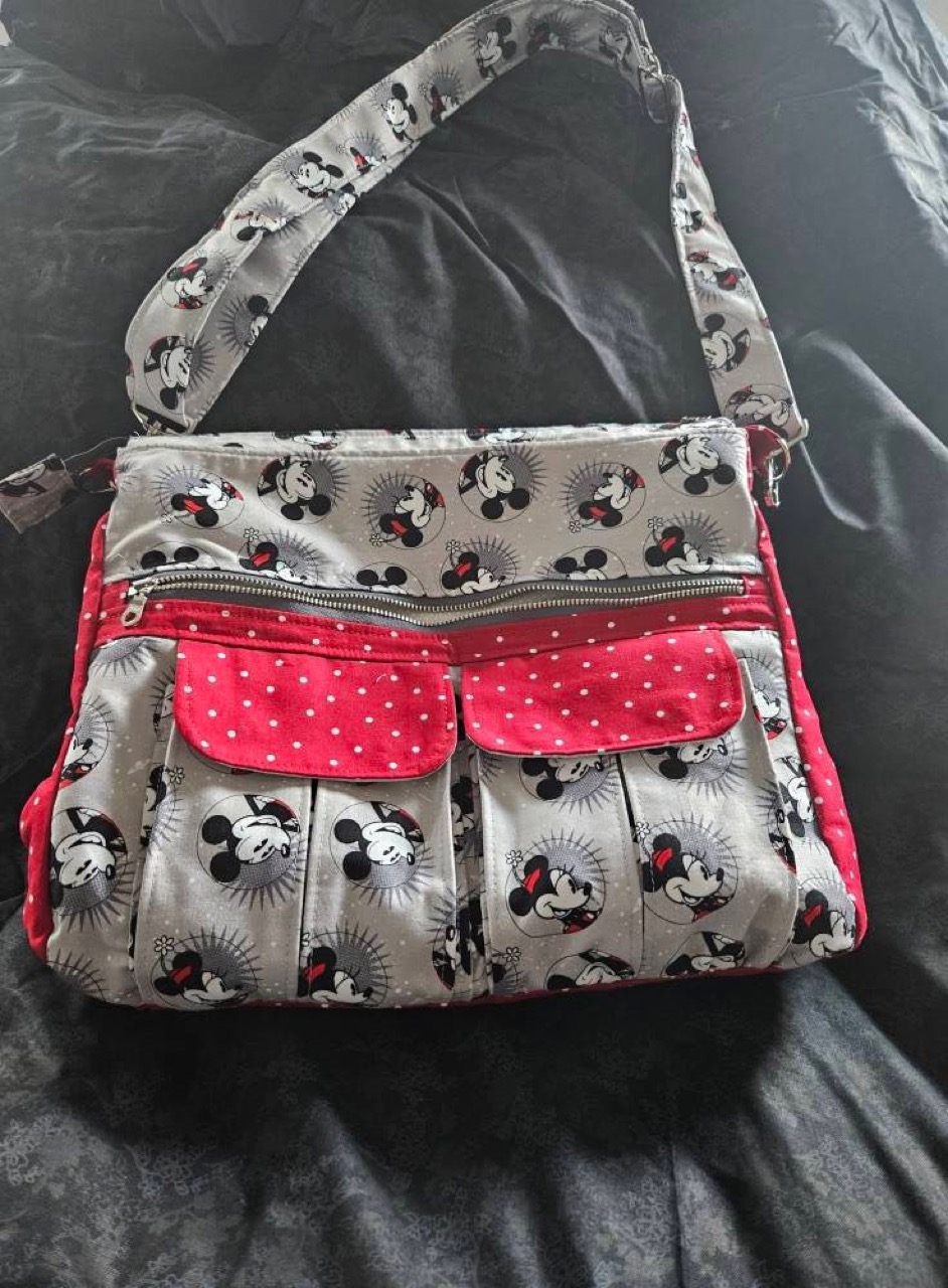 Handmade Minnie Mouse crossbody bag with red polka-dot pockets